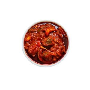 Avakai Pickle is a timeless South Indian favourite made with raw mango pieces mixed in stone-ground mustard powder, red chilli powder, salt, and pure gingelly oil. Prepared using age-old traditional methods, this pickle delivers a bold, spicy, and tangy flavour that perfectly complements hot rice, curd rice, dosa, and idli. Every spoonful brings the authentic village-style taste straight to your plate.