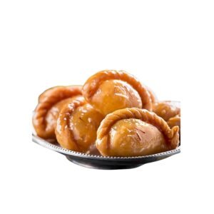 A royal South Indian sweet made for celebrations. Crispy on the outside, rich and flavorful on the inside, Chandrakala is a timeless delicacy filled with a delicious mix of khoya, nuts, and aromatic spices—deep-fried to golden perfection and soaked lightly in sugar syrup.