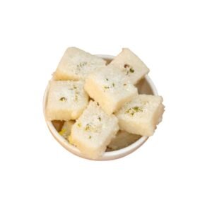 Soft, aromatic, and mildly sweet, Coconut Burfi is a timeless Indian sweet made with fresh coconut and slow-cooked to perfection. Each bite melts in your mouth, delivering a rich coconut flavor that feels homely and comforting. Perfect for festive moments, gifting, or a simple sweet craving.