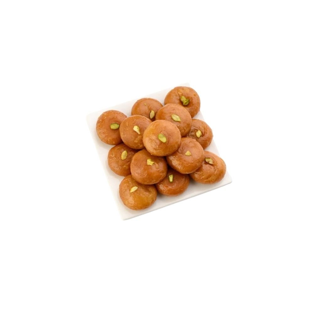 Soft, flaky, and mildly sweet, Mini Badhusha is a bite-sized version of the classic South Indian sweet. Made with pure ghee and traditional ingredients, each piece melts in your mouth with a rich, buttery taste. Perfect for festivals, pooja, gifting, or anytime sweet cravings.