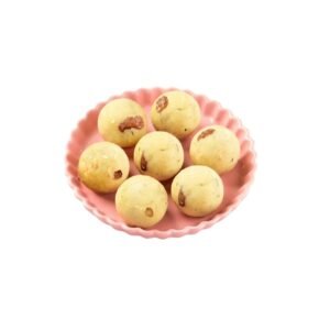 Rava Laddu is a classic South Indian sweet made with roasted rava, pure ghee, sugar, and aromatic cardamom. Soft, rich, and mildly grainy, each laddu melts in your mouth and brings back the warmth of homemade festive treats. Perfect for pooja, celebrations, or everyday sweet cravings.
